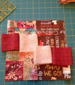 quilting blocks with travel and flower fabrics